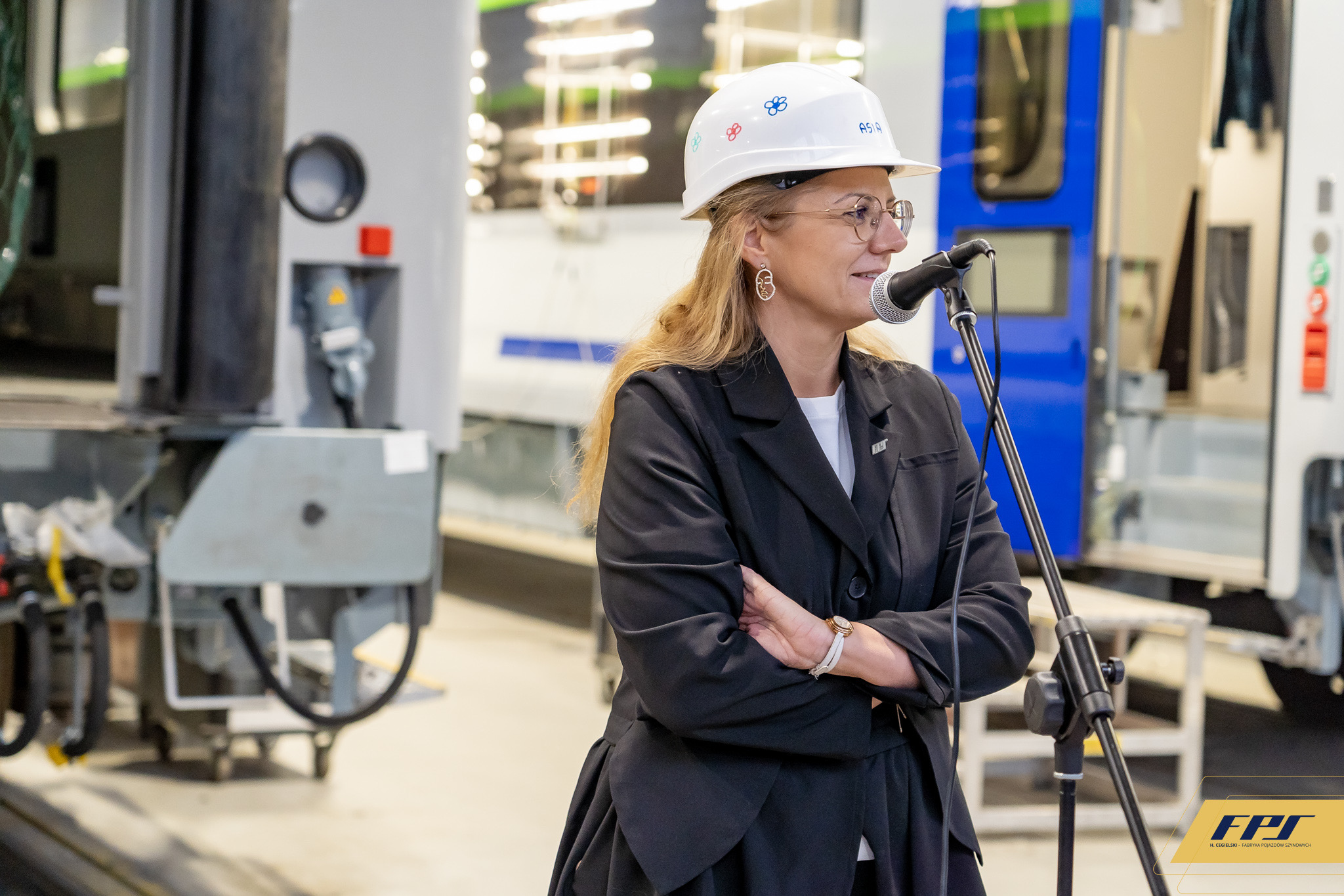 Joanna Małecka prowadzi wydarzenie w H. Cegielski — Fabryka Pojazdów Szynowych